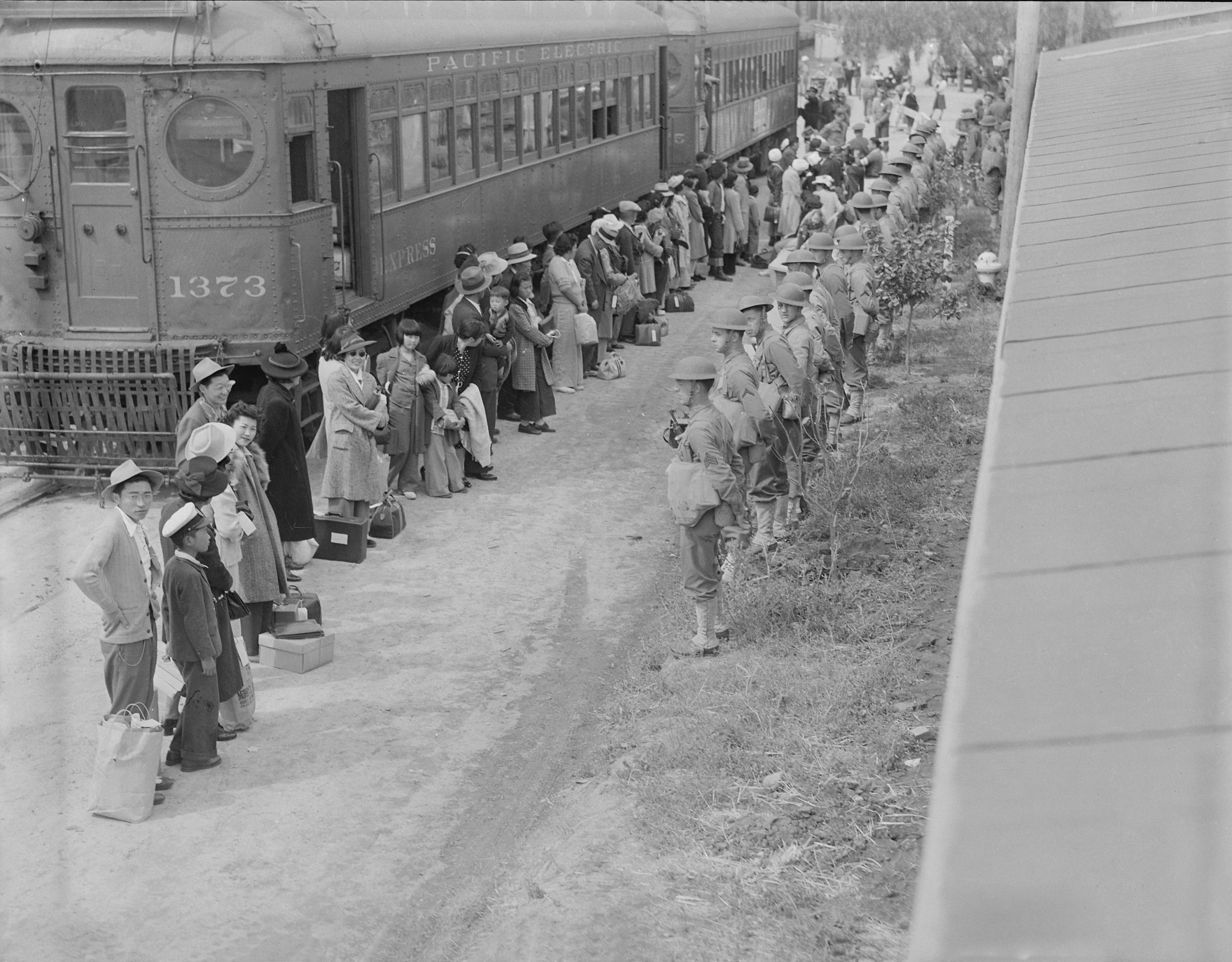 Persons of Japanese ancestry arrive at the Santa Anita Assembly center from San Pedro, California